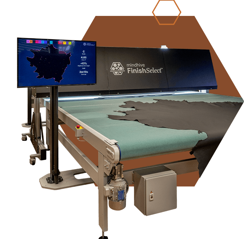  Mindhive FinishSelect™ automated defect detection system inspecting finished leather with live grade and quality data on display